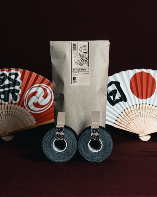 Kakuto Finger Tape 10 Pack in black and white for BJJ, judo and grappling