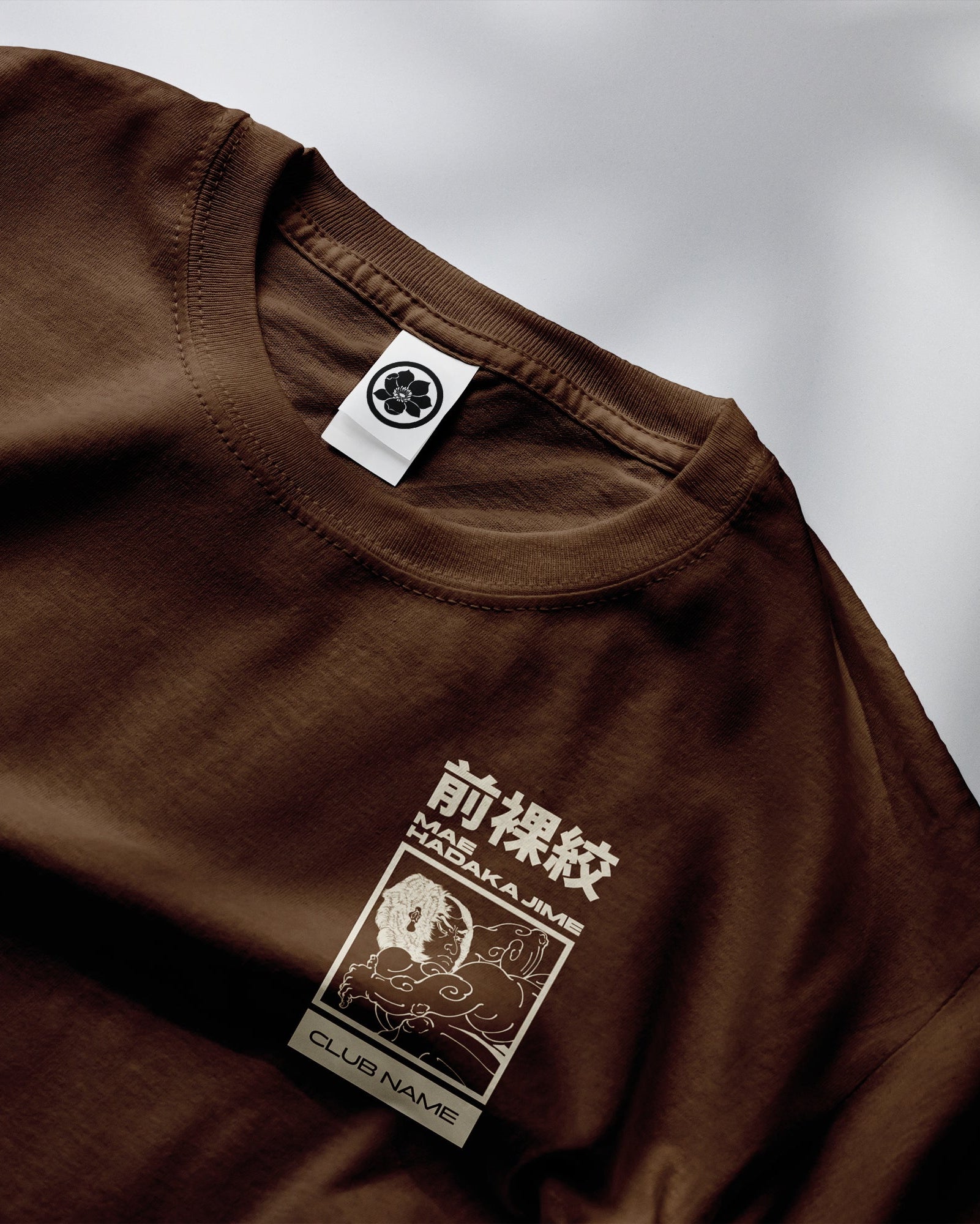 High Elbow Guillotine BJJ merch artwork mockup on a black T-shirt, featuring Japanese-inspired Mae Hadaka Jime design for martial arts academies.