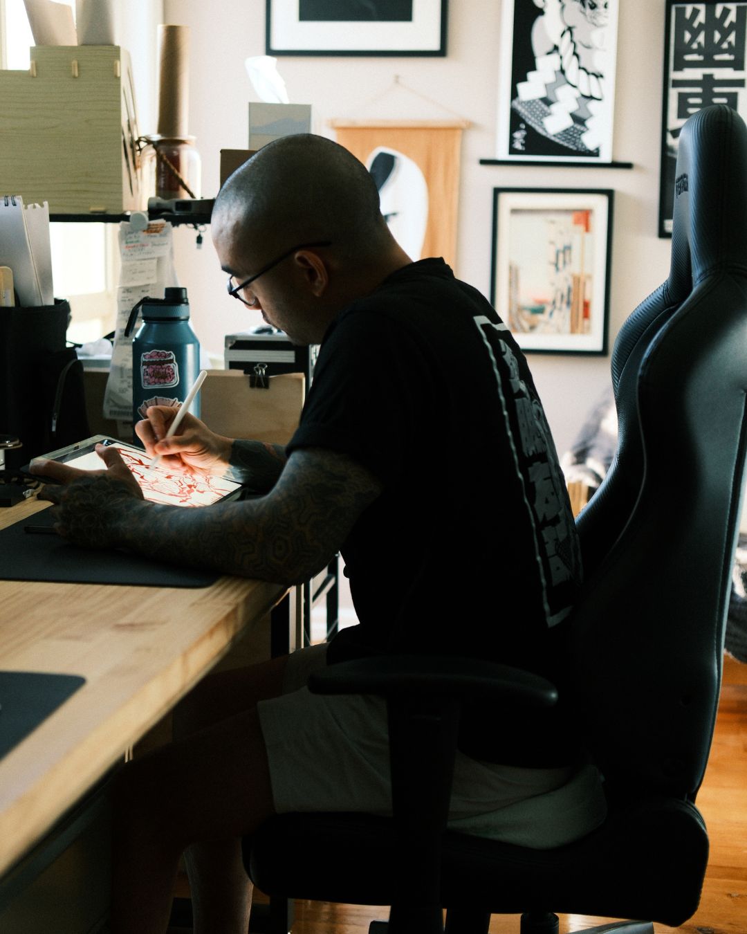 grappler holding 10 pack of finger tape with white finger tape wrapped around his fingers. Grappler is wearing kakuto culture's rashie.
