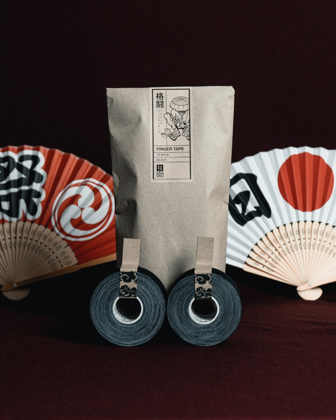 Kakuto Finger Tape 10 Pack in black and white for BJJ, judo and grappling