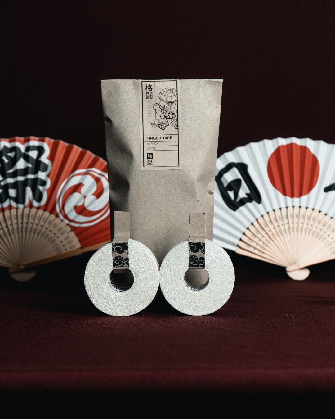 Kakuto Finger Tape 10 Pack in black and white for BJJ, judo and grappling